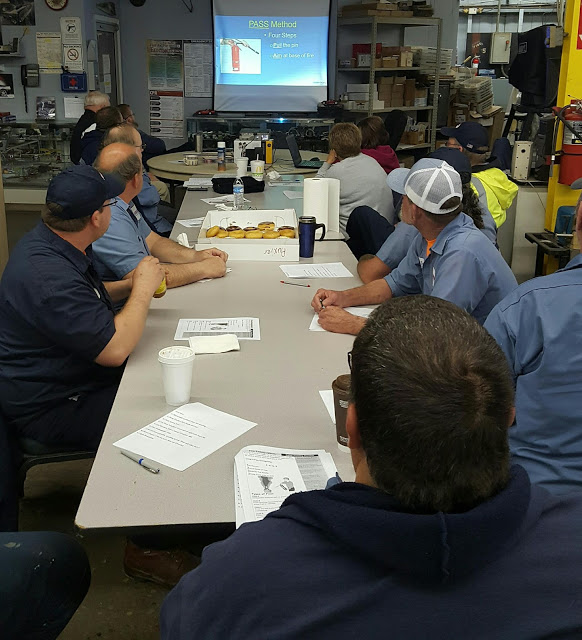 Image of employees in training