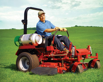 Image of man on riding propane lawn mower