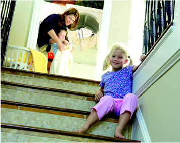 Image child sitting on stairs